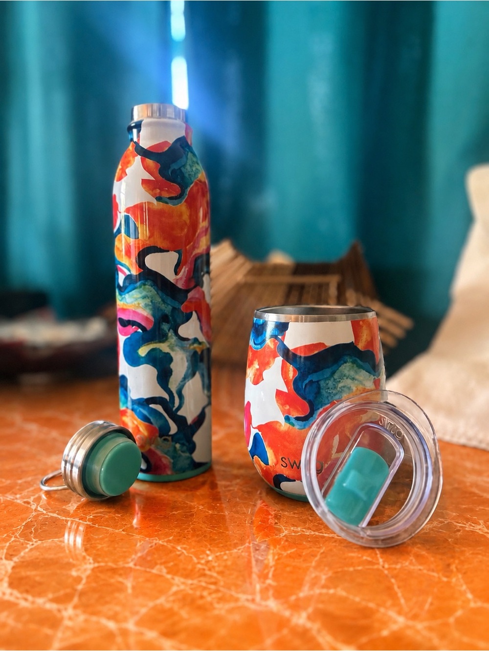 Set of Swig Life insulated matching cups in the “dreamsicle” color way